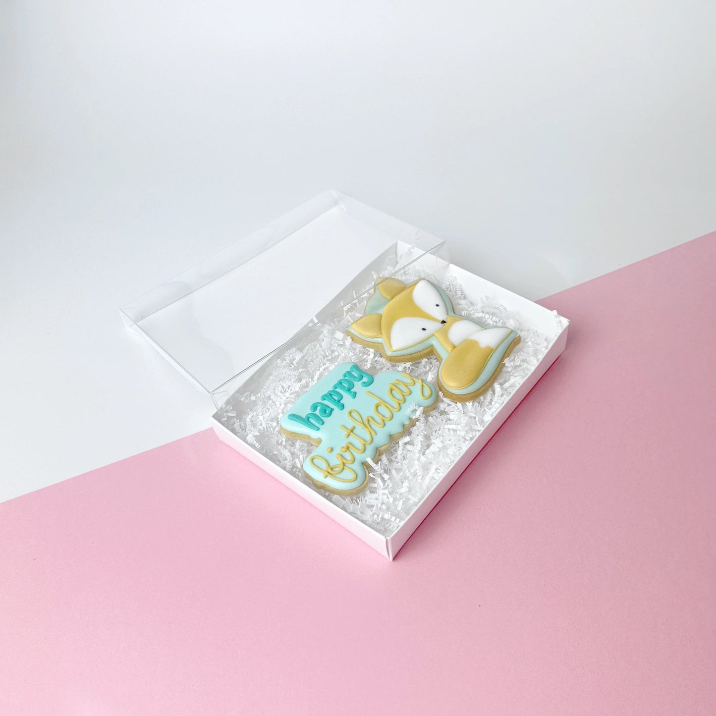 Set di 5 scatole rettangolari bianche con coperchio trasparente, profilo basso ideale per packaging regalo.