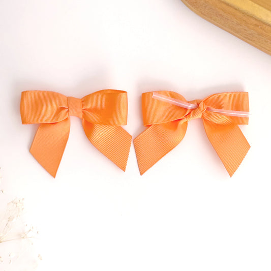 Fiocco arancione prelegato 8x6cm per sacchetti biscotti e regali.