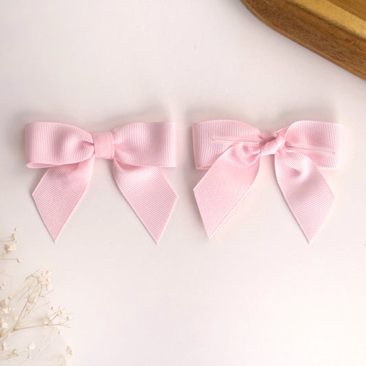 Fiocco rosa chiaro prelegato 8cm per bomboniere nascita bambina.
